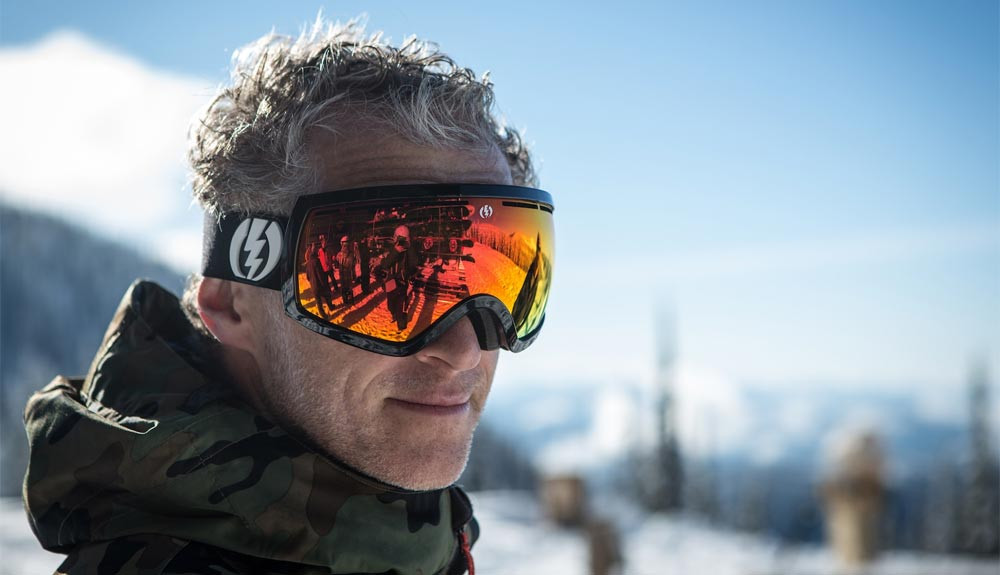 Gafas de nieve con rayos del sol poniente equipo de deportes de invierno  ilustración generativa de ia